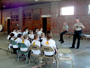 image of officers teaching about gun safety