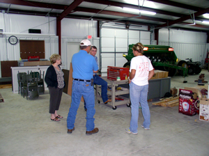 image of guests visiting new equipment shop