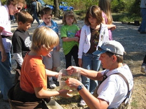 image of Jean Lemmon showing insect collections to students