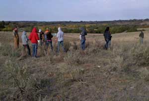 FFA and 4H members and adults in rangeland.