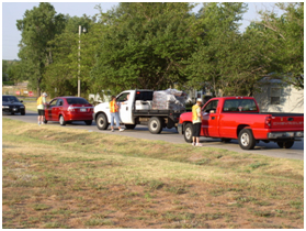 image of cars in line at eCycles day. 