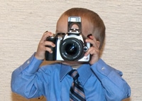 image of child with digital camera
