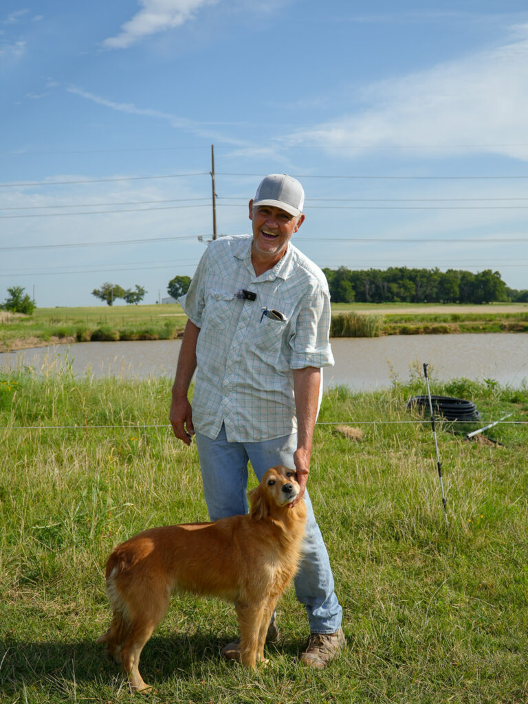 David McCollough standing with his dog Josie.
